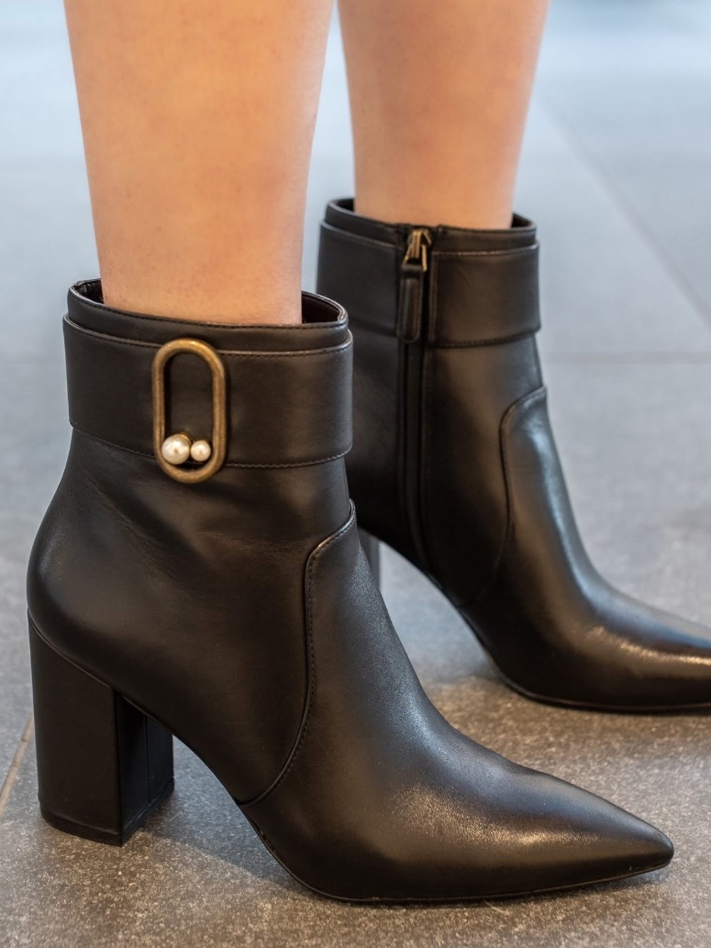Black Leather Pointed-Toe Ankle Boots with Decorative Buckle. Nine West Genuine